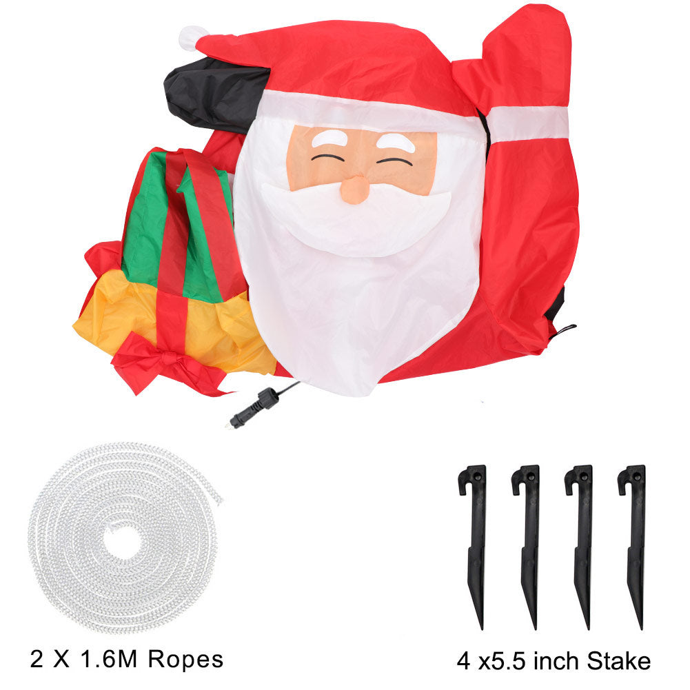 Deflated inflatable Santa, Rope, Pegs